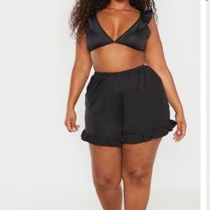 Prettylittlething black frill hem swim shorts size 20